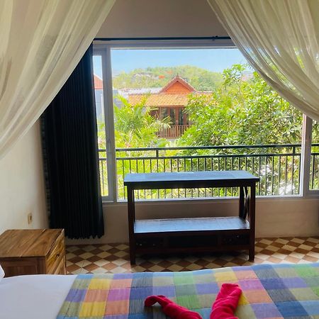 Arjuna Uluwatu Guest House Extérieur photo