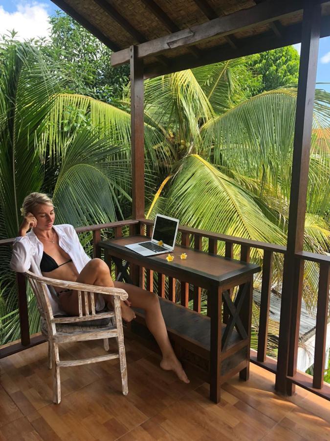 Arjuna Uluwatu Guest House Extérieur photo