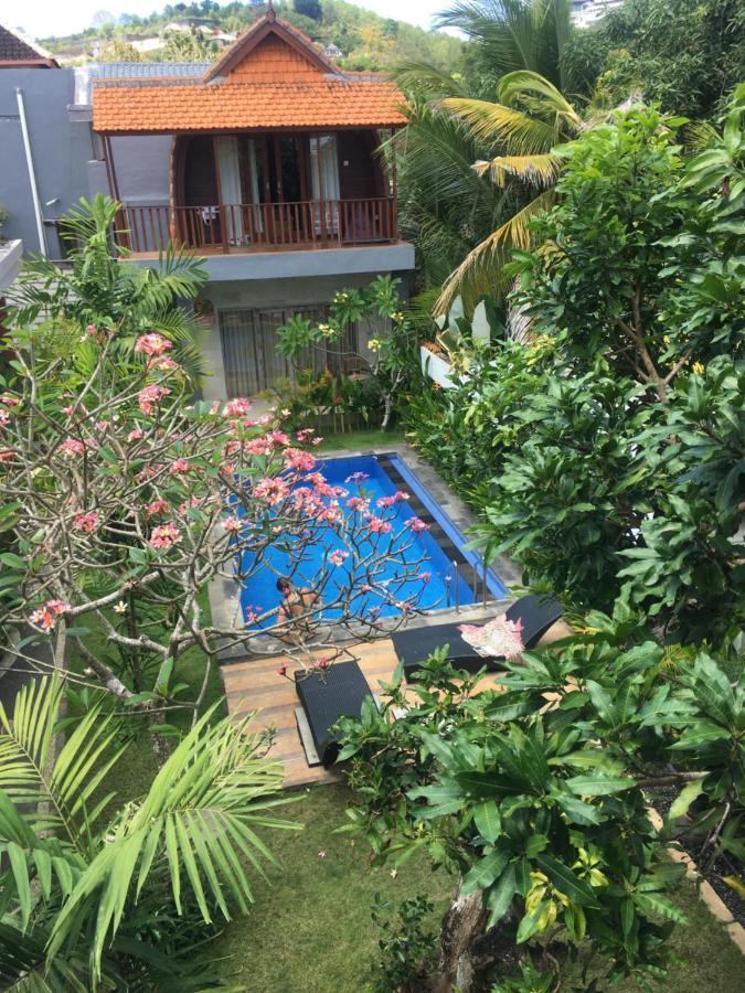 Arjuna Uluwatu Guest House Extérieur photo